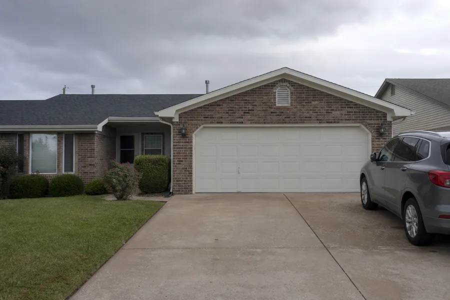A house with an attached garage in Wichita, KS
