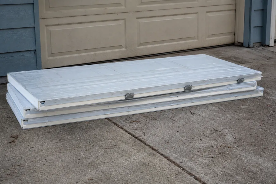 New insulated door sections on the driveway in Wichita, KS